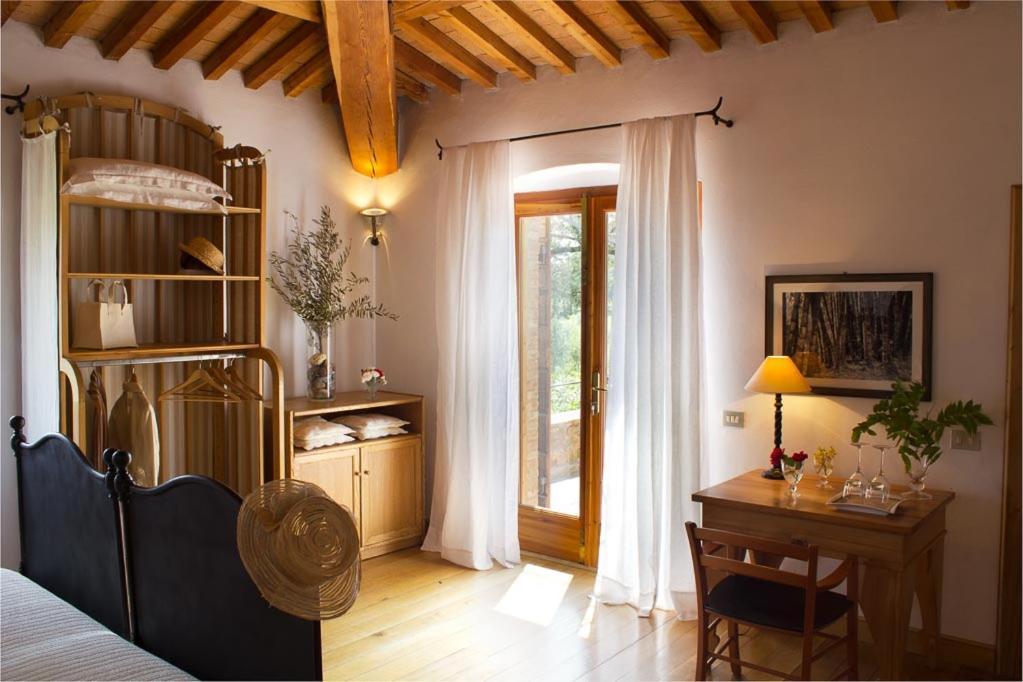 Podere Le Mezzelune บิบโบนา ภายนอก รูปภาพ